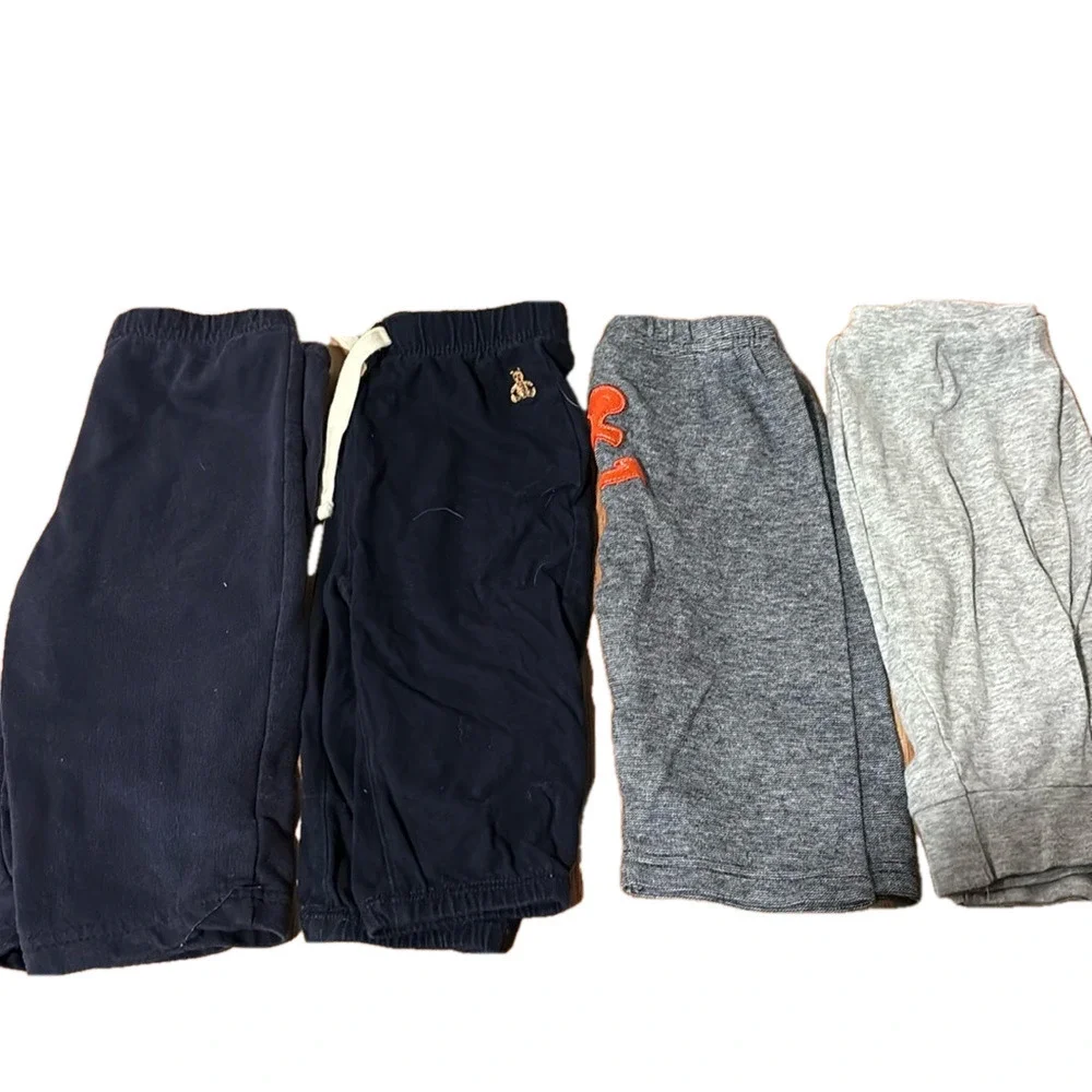 4 pairs of 6-9 month baby pants- blue and gray-